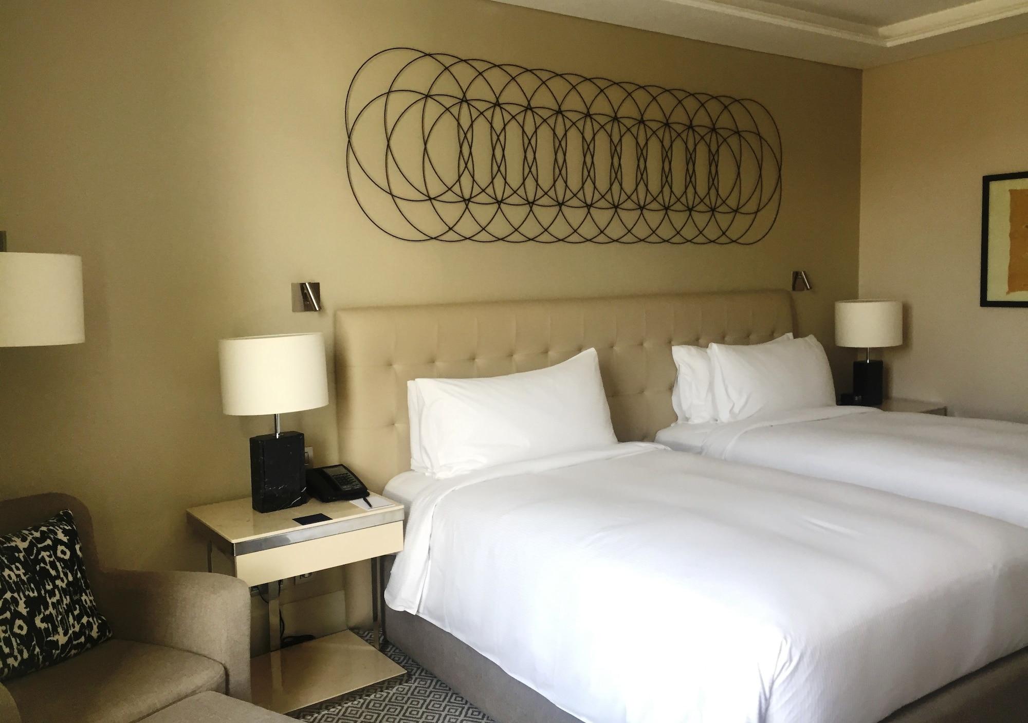 Hilton Tanger City Center Exteriör bild A room at the hotel