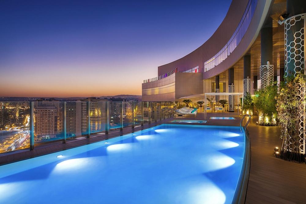 Hilton Tanger City Center Exteriör bild The pool at the 360° Sky Lounge