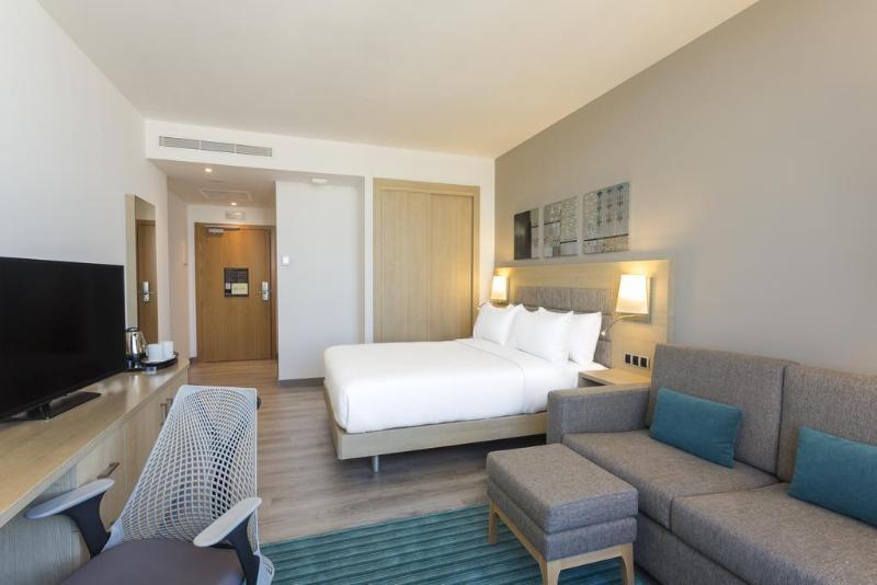 Hilton Tanger City Center Exteriör bild A room at the hotel